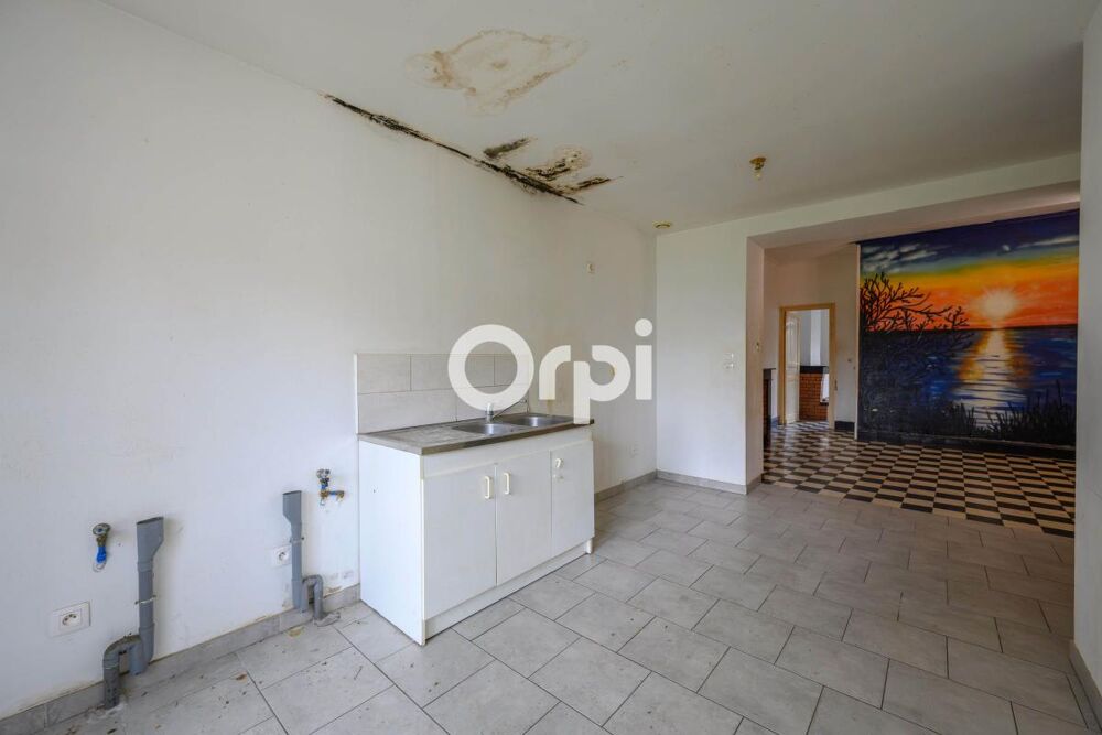 Maison à rénover avec jardin à vendre située à Râches à 5 minutes de Douai
