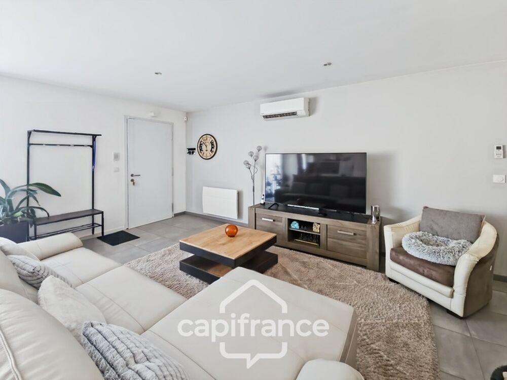 Maison de plain pied construite 2019, 3 chambres, jardin, garage, lumineuse, secteur calme, accès du jardin à la voie verte