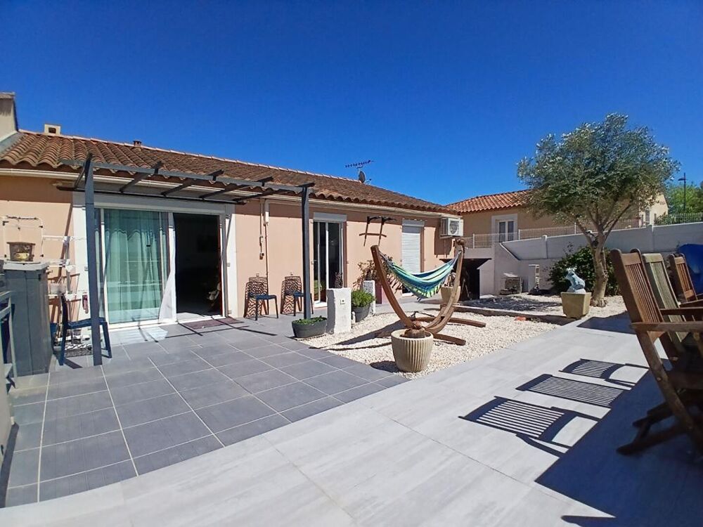 Maison plain-pied 4 chambres avec terrasse et jardin