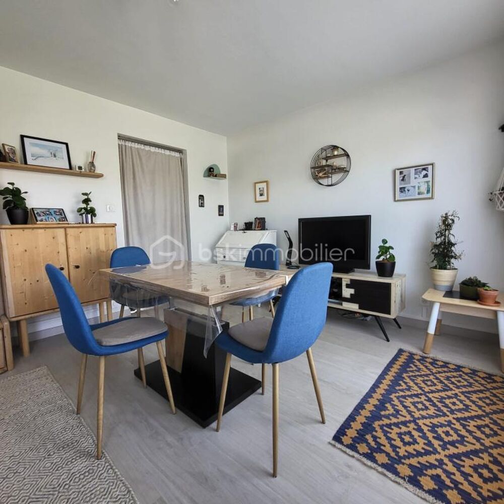 Roanne proche centre appartement 2 pièces de 51 m² au RDC surélevé, petit balcon coté Est, et cave au dessous de 8 m²