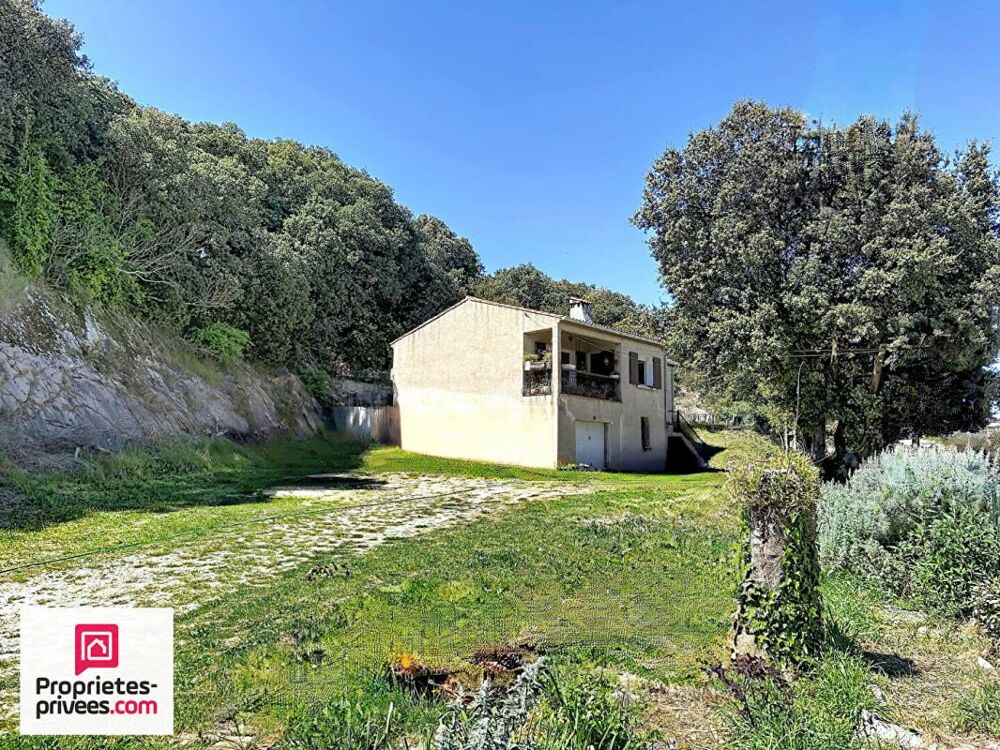 Villa avec grand garage sur 2360 m² de terrain divisible