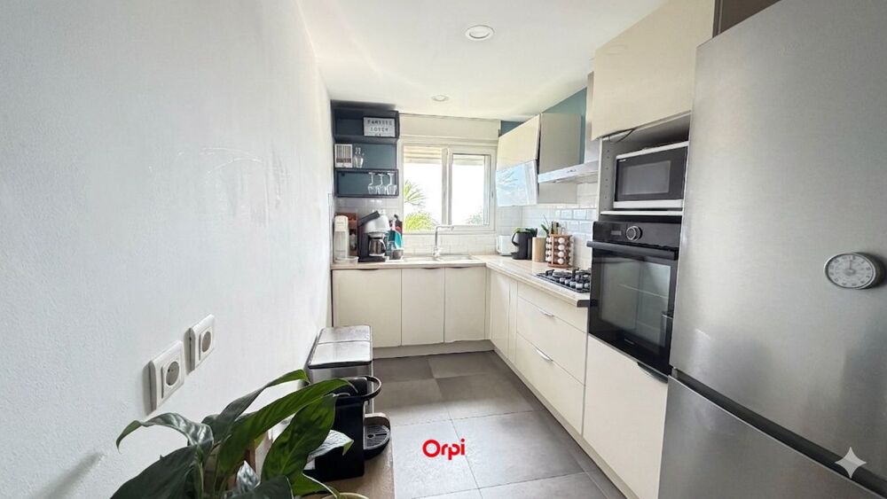 ORPI LA POSSESSION - Appartement T4 Vue Mer à vendre