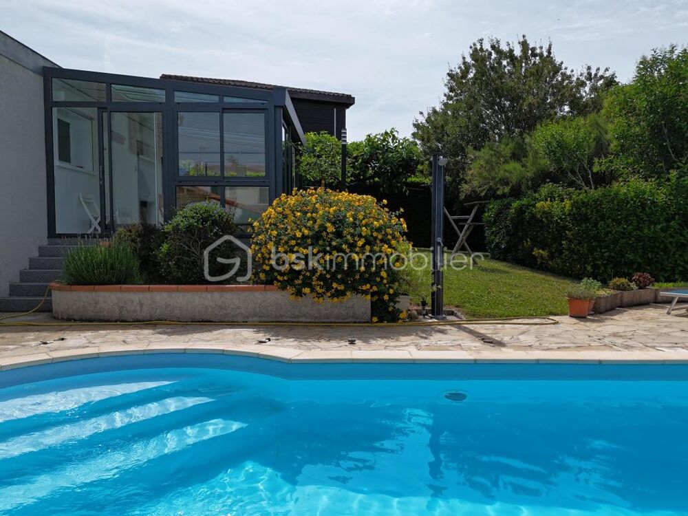 Vente Maison ESCALQUENS : Maison familiale avec piscine, véranda et double garage sur plus de 1 000 m² Escalquens