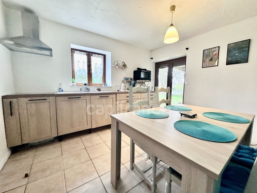 Vente Maison Maison en pierre de 244 m2 habitables avec chambres d'hôtes et 8500 m2 terrain à vendre CHAMP DU BOULT (14) Champ du boult