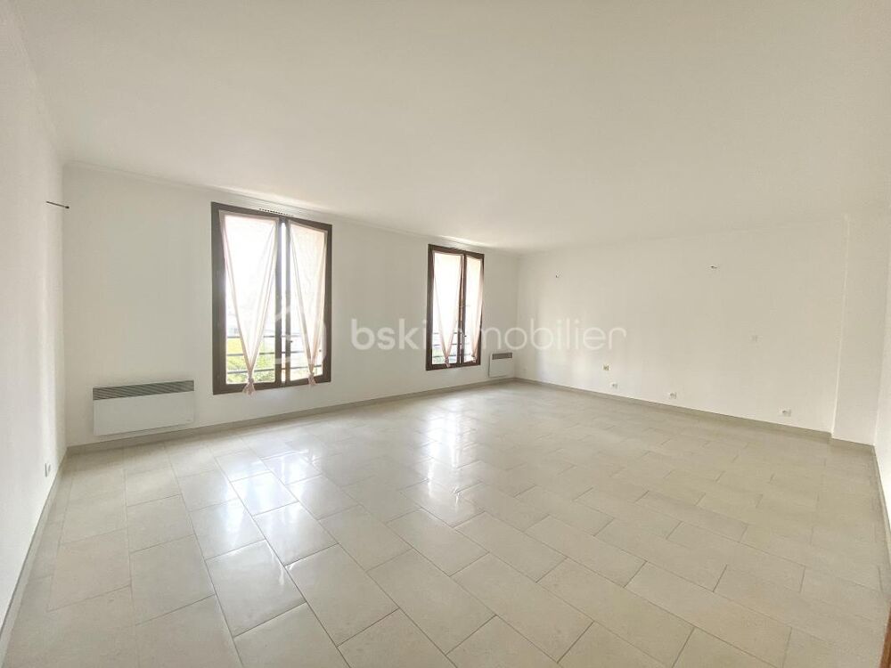 Appartement familial avec grand balcon et cave en centre-ville