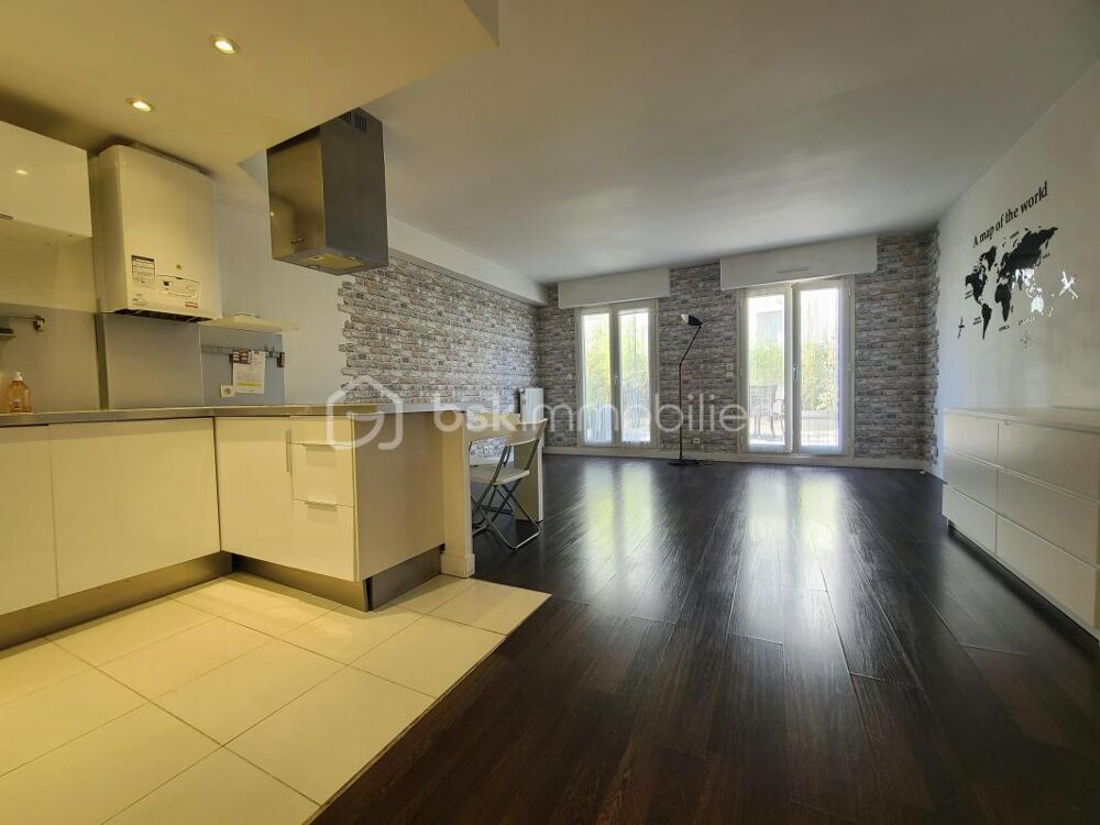 Appartement de type F2 d'environ 48m2 au rez-de-chaussée avec terrasse et parking en sous sol