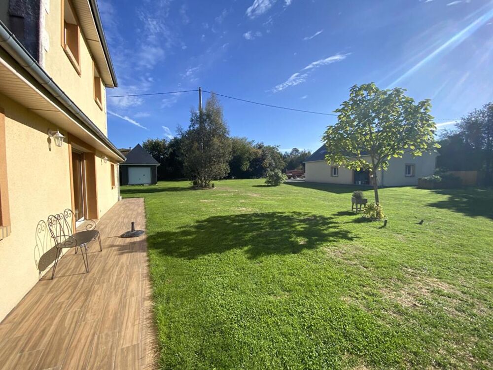 Maison moderne au calme au coeur du pays d'auge , avec ses annexes dont 5 garages