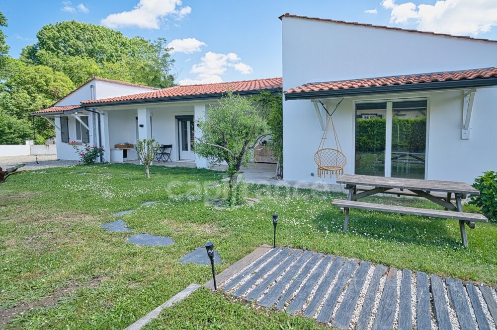 Maison de plain-pied 156 m²  5 chambres - Montussan