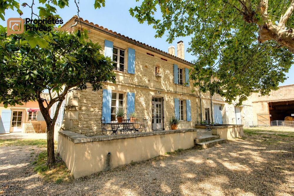 Vente Maison TARASCON  EN EXCLUSIVITÉ  Exceptionnel mas en pierre rénové de 364 m² habitables, offrant près de 1294 m² bâtis sur un terrain c Tarascon