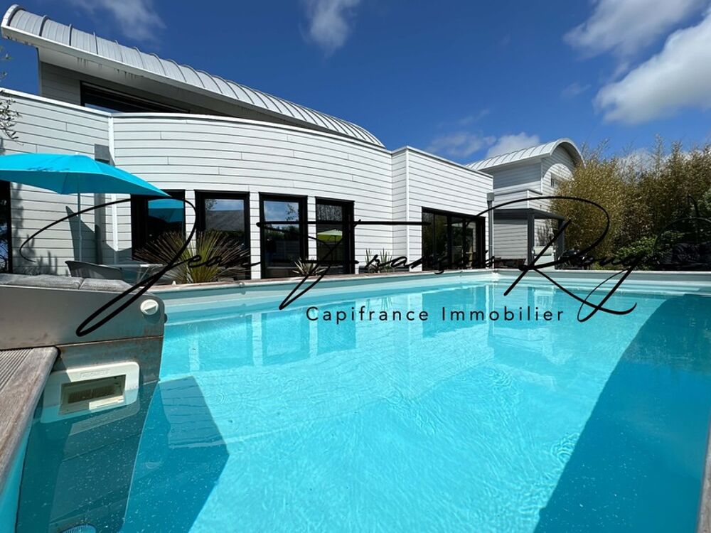 AGON-COUTAINVILLE, à 600 mètres de la plage, superbe maison d'architecte construite en 2007 d'une surface de 320 m², avec piscin