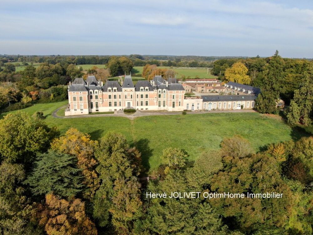  BATIMENT EN PIERRE AVEC BUREAUX ET LOCAUX COMMERCIAUX Le cellier