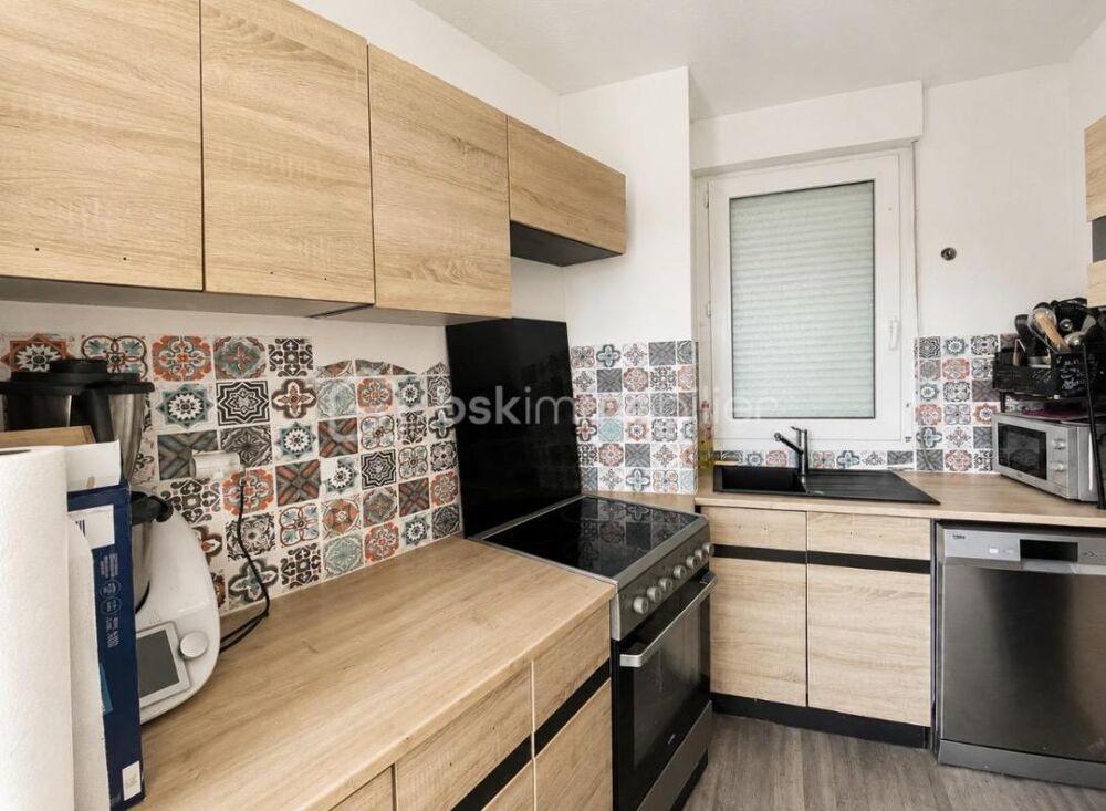 EXCLUSIVITÉ  T2 bis en duplex avec balcon, garage et cave à Saint-Genis-Laval