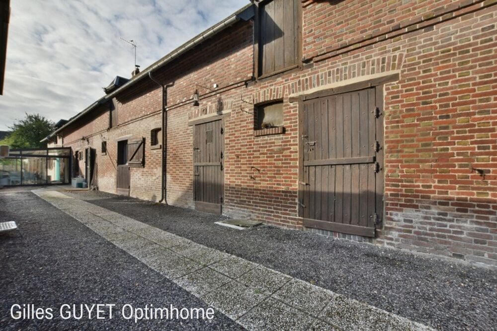 10MN de BERNAY T7 157M² 185000€ avec garage et terrain de 500M² ( Bourg avec commerces)