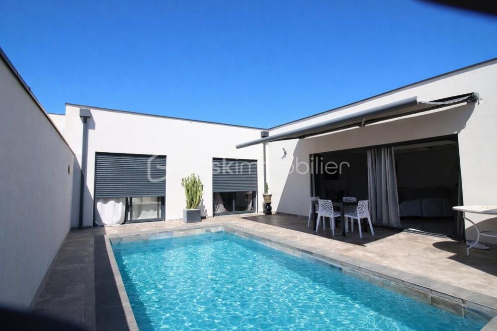 VILLA CONTEMPORAINE DEXCEPTION  PLAIN-PIED EN U AVEC PISCINE