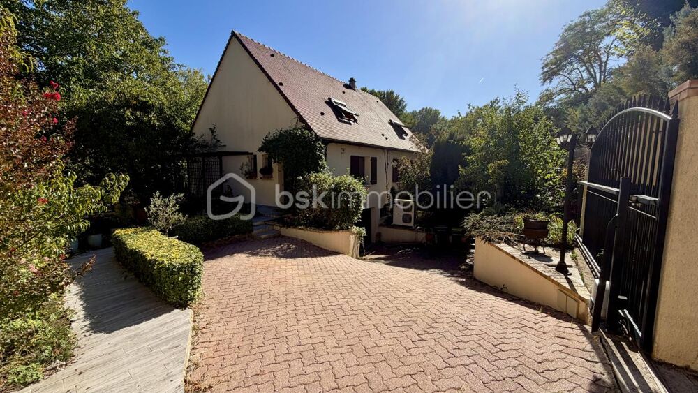 Maison traditionnelle de 290m² utiles avec sous-sol total et véranda