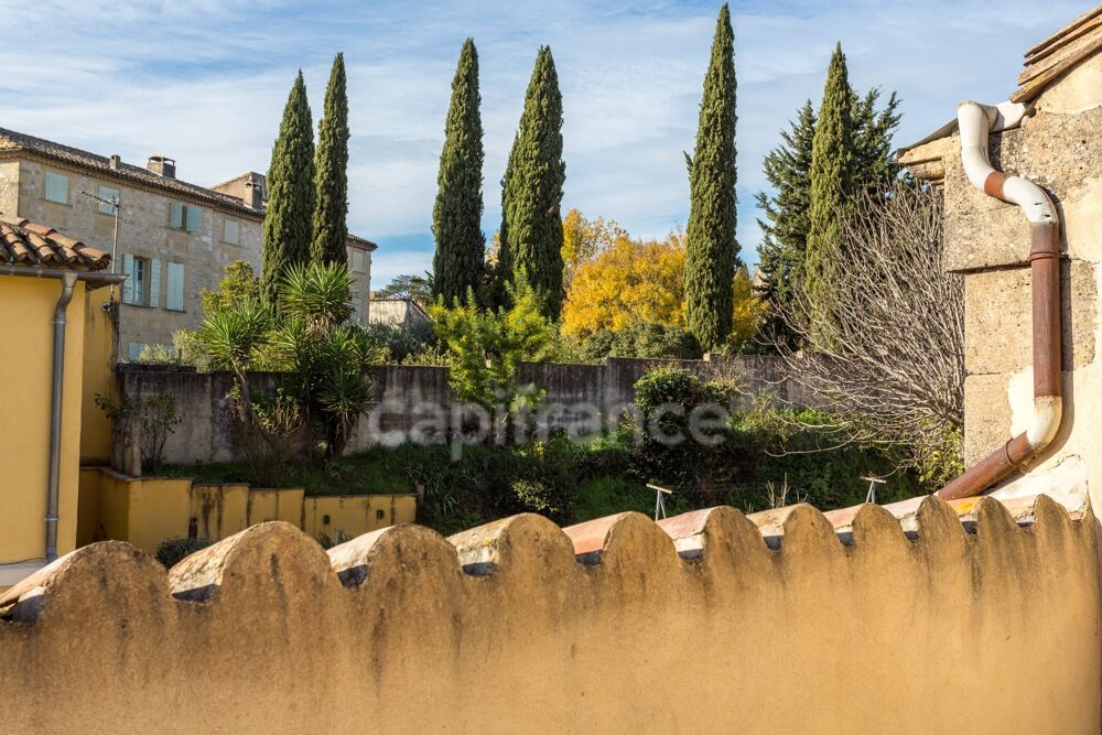 Terrasse en toiture & grand garage : une maison de village rare proche dUzès