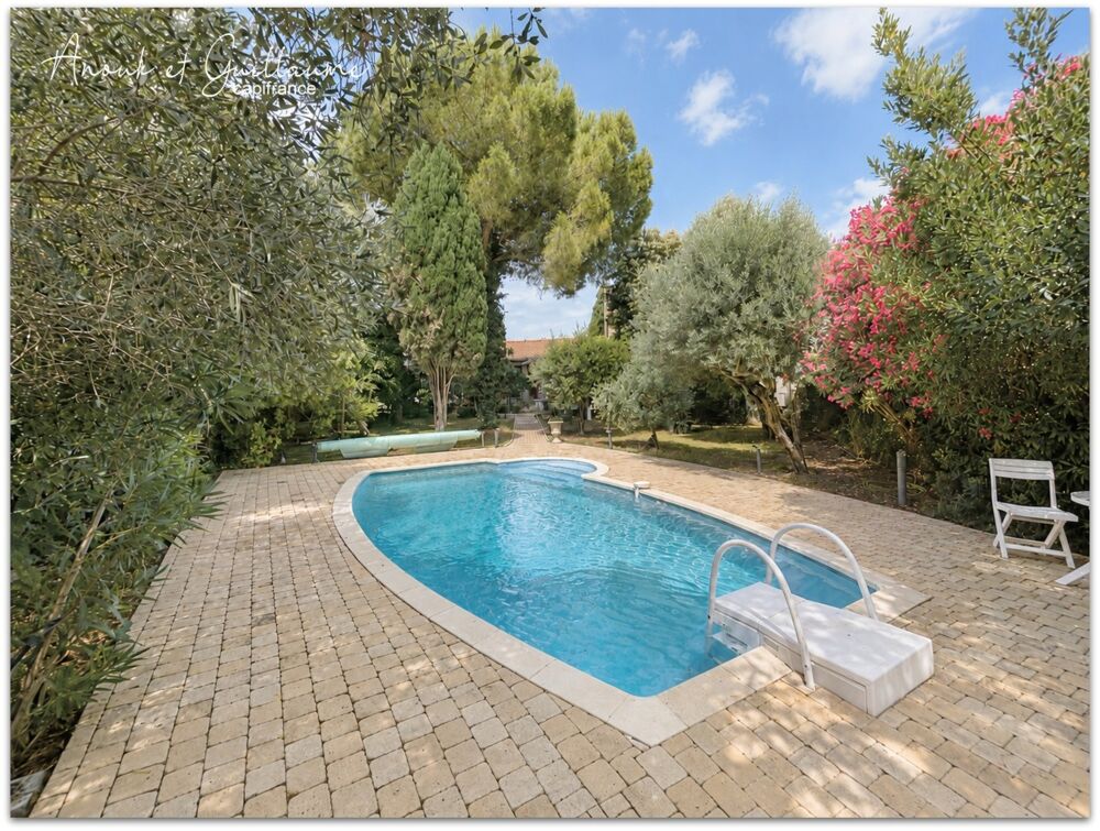 Exclusivité - Villa familiale 171.77 m² habitable environ 6 pièces avec piscine, jardin paysager, garage et carport  ROUJAN (34