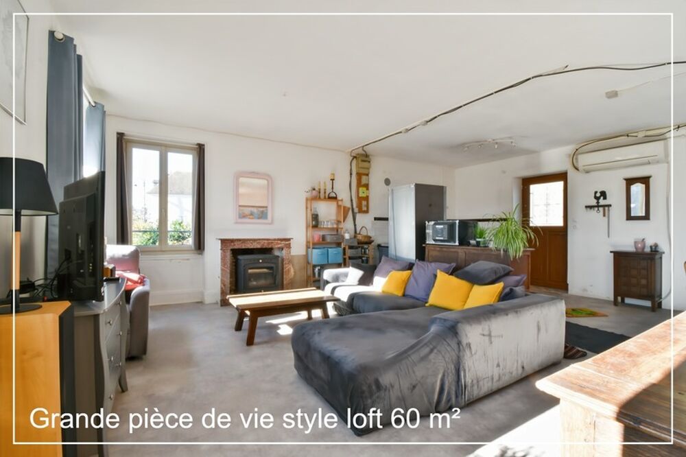 Maison de plain-pied type loft avec jardin paysagé, garage et fort potentiel  Culan