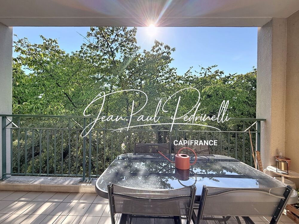 Tassin-la-Demi-Lune - Appartement 2 pièces de 48 m² avec balcon, parking privatif et cave - résidence sécurisée récente