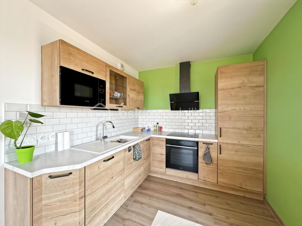 Appartement 3 chambres avec balcon et 3 places de parking