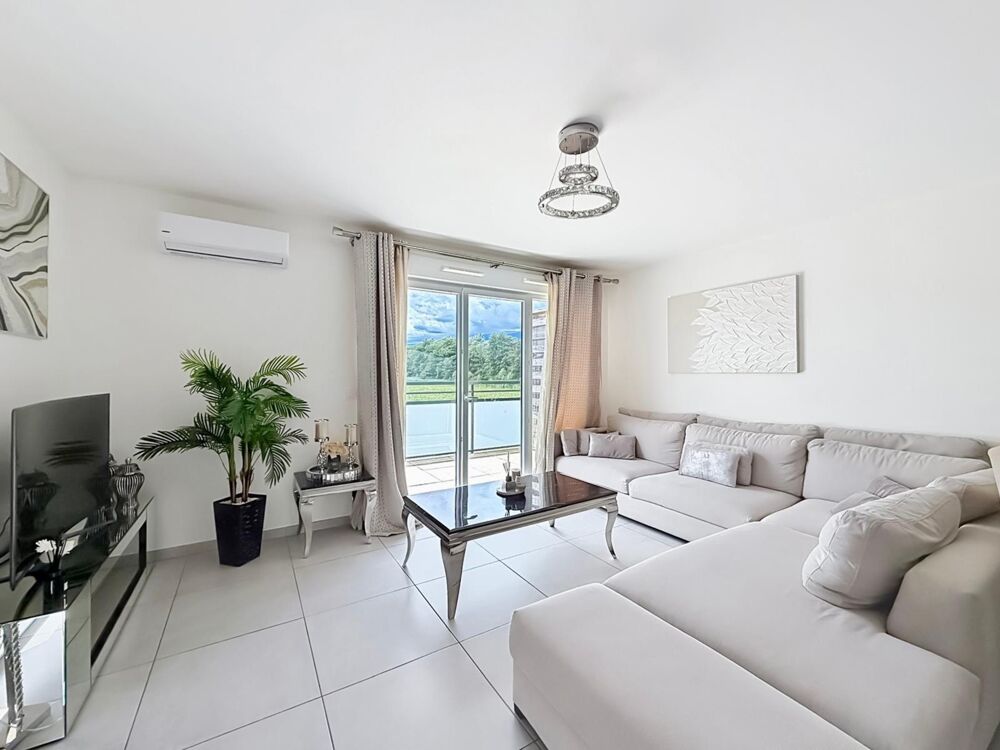 Joli Appartement T4 récent avec balcon, garage double et climatisation  ORNEX (01)