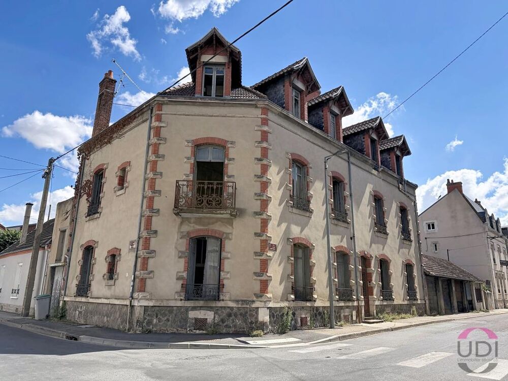 Vente Immeuble Immeuble de rapport de caractère avec 6 appartements, 5 garages et jardin Montlucon