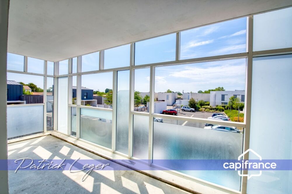 Vente Appartement PÉRIGNY (17) – Élégant T3 modulable avec grande terrasse couverte & parking sous-sol Perigny