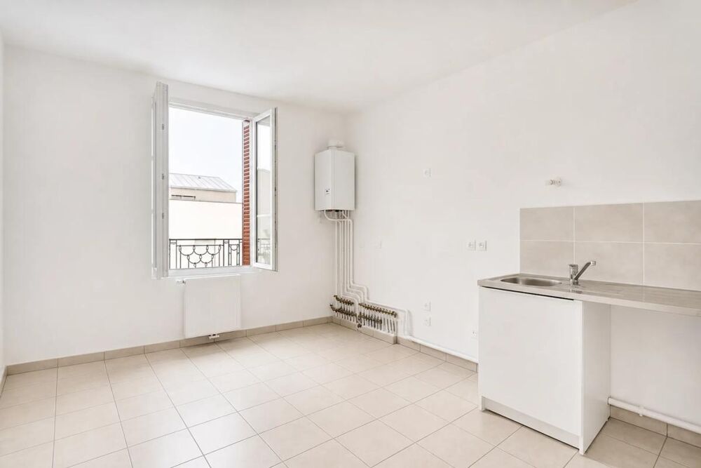 Appartement 5 pièces de 126 m² sur 3 niveaux avec balcon, jardin