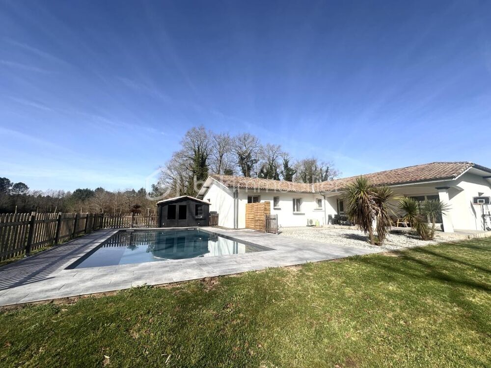 ***Maison familiale refaite à neuf avec deux espaces de vie distincts, piscine et grand terrain