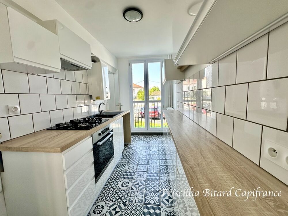 Appartement T4 en rez-de-chaussée avec jardin privatif et cave