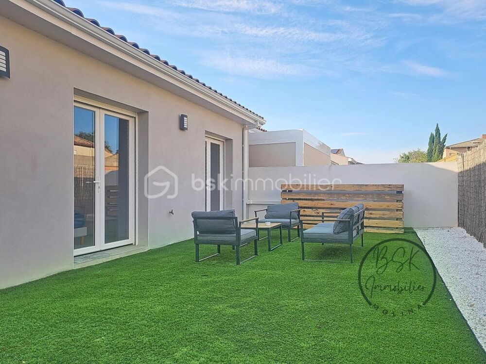 Villa plain pied deux chambres avec garage et jardin