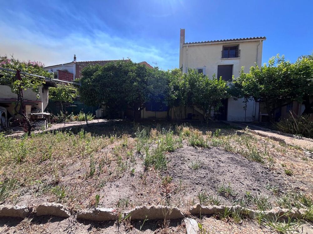 Charmante maison familiale de 230 m² avec double garage et jardin sur un terrain deux faces