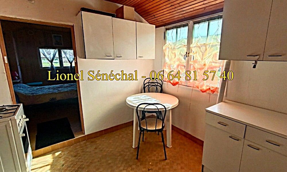 Vente Terrain Terrain de loisirs de plus de 500 m2 + un chalet de loisirs en dur de 24 m2  avec un accès direct à la rivière Neuville sur sarthe