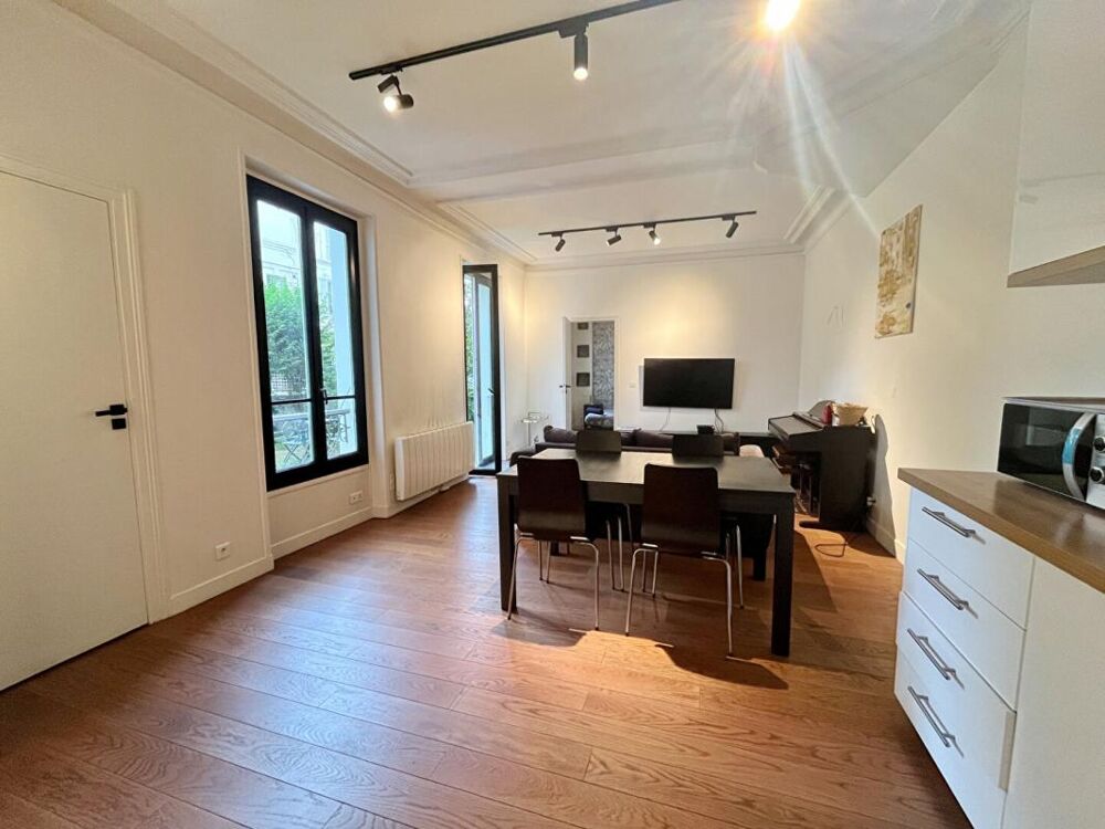Location Appartement Appartement avec jardin cité Lemercier Paris 17