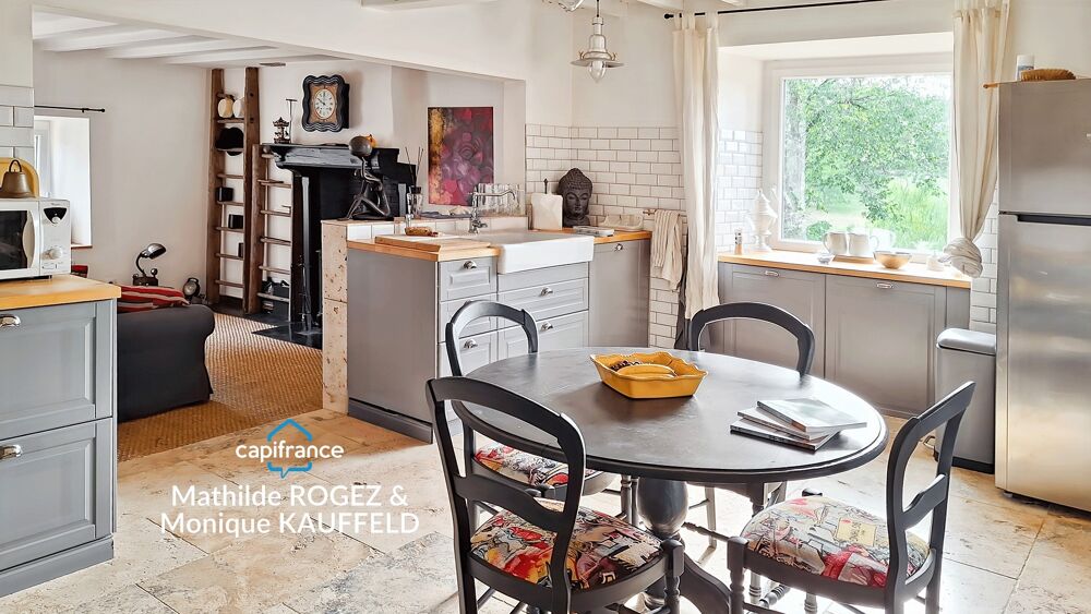 CUNLHAT  ENSEMBLE IMMOBILIER AVEC 2 MAISONS, JARDINS ET DÉPENDANCES  PROCHE GOLF