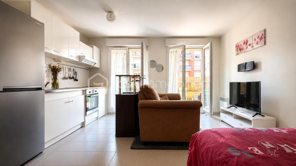 STUDIO VENDU LOUÉ  30,86 m²  JARDIN  PARKING