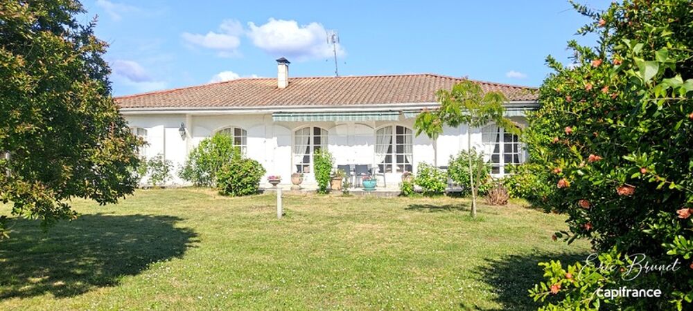 Charmante maison de plain-pied 4 chambres sur beau terrain arboré de 1 450 m²
