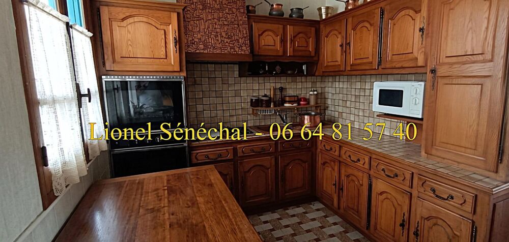 Vente Maison Maison de bourg  de plain - pied 6 pièces de 102 m2  avec un grand garage sur une parcelle de 400 m2 Souligne sous ballon