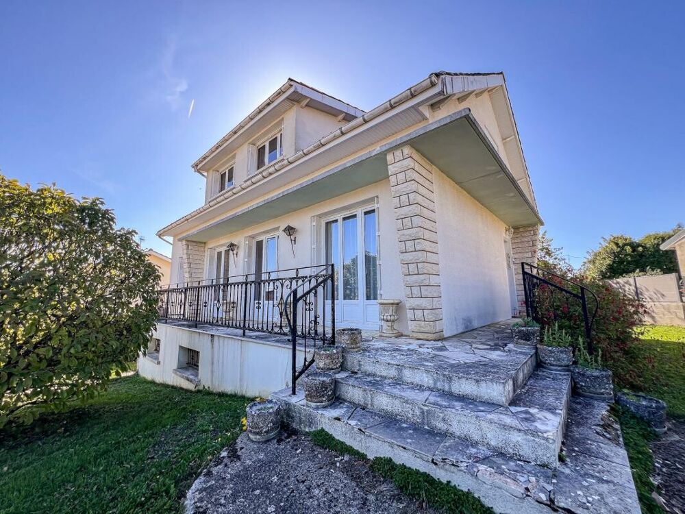 Maison familiale des années 70 avec jardin arboré à 10 min d