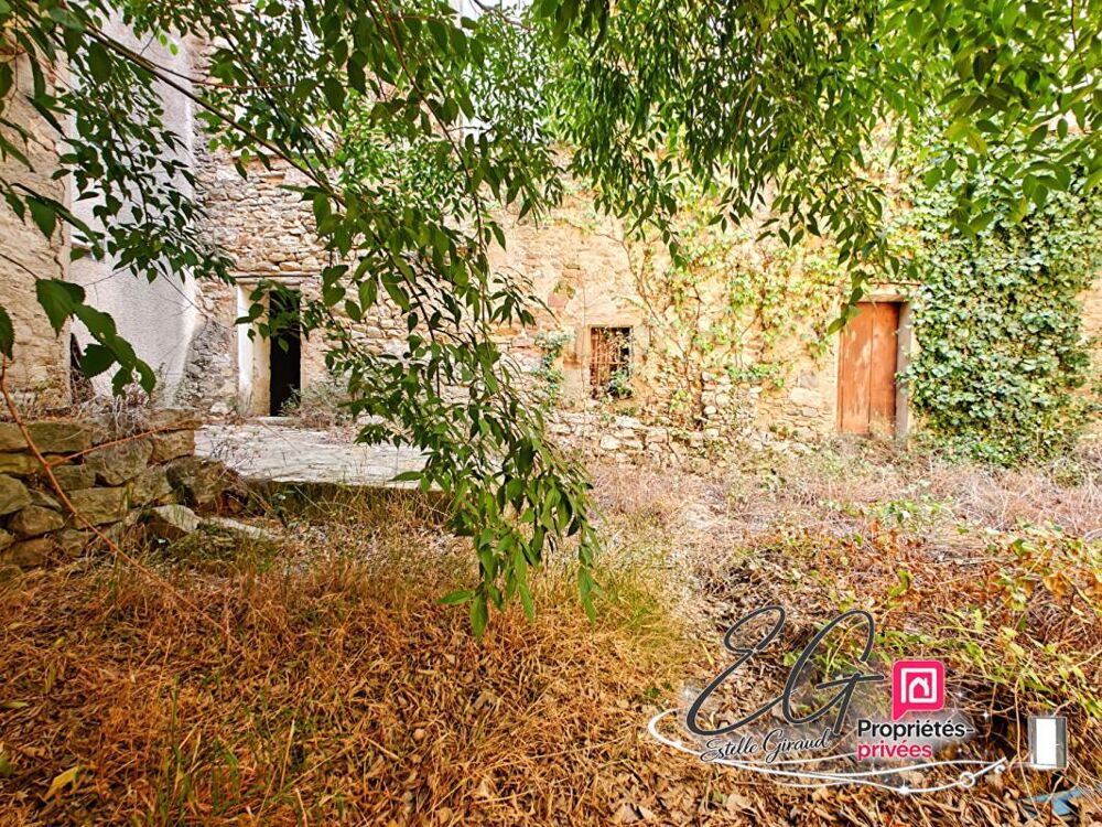 Maison en pierre à rénover : jardin, garage, grenier aménageable