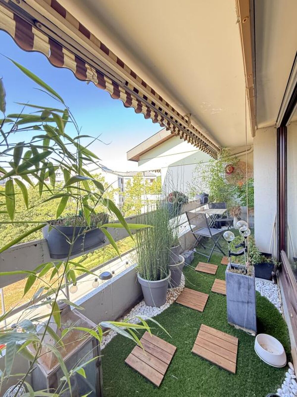 Appartement 4 pièces avec balcon, cave et parking sécurisé - Seynod