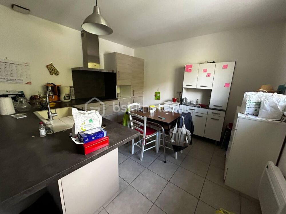 Appartement 70 m2 / 1 CHAMBRE / 1 Garage / Jardin