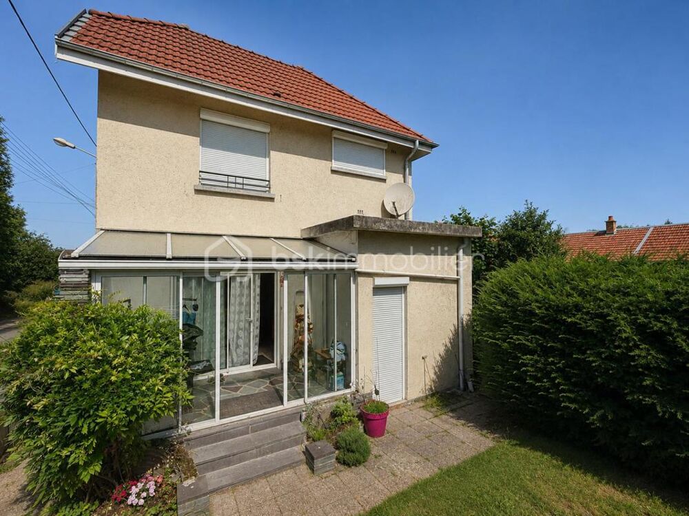 ATTIGNY  Maison familiale à rénover avec jardin, garage et fort potentiel