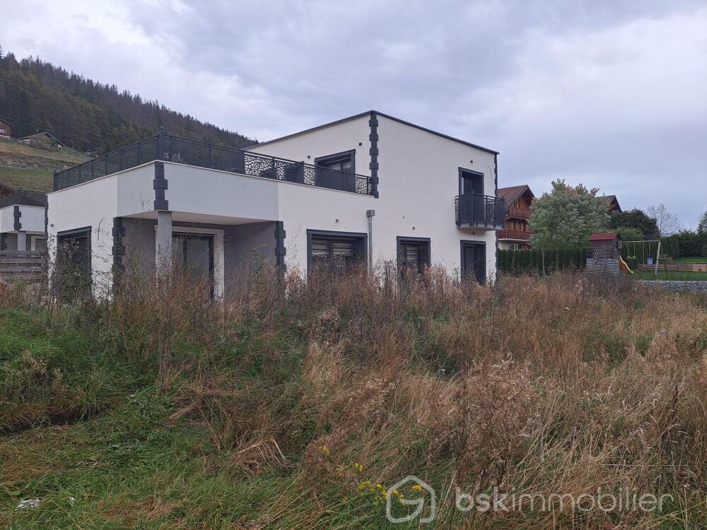 MAISON RT2012 avec garage, terrasse et terrain de 485 m²