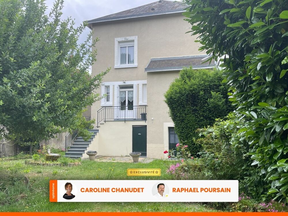 Maison à double distribution avec 2 garages et 1000m2 de terrain clos