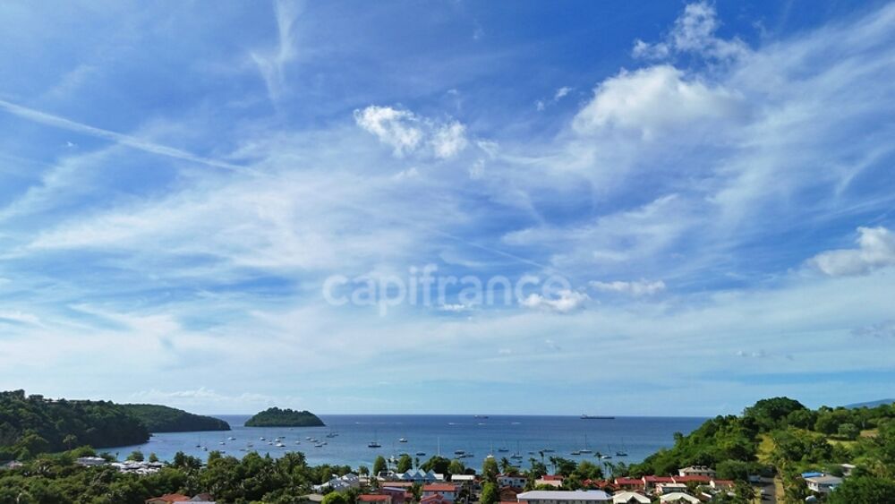 Les Trois-Îlets  Villa prestige T5 de 146 m² habitables (219 m² au total) avec piscine, solarium et vue mer imprenable- A Vendr