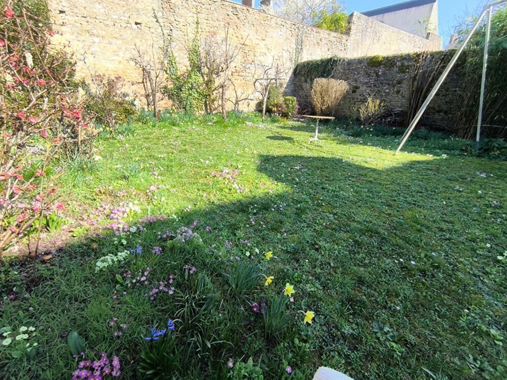 Maison hyper centre ville avec jardin