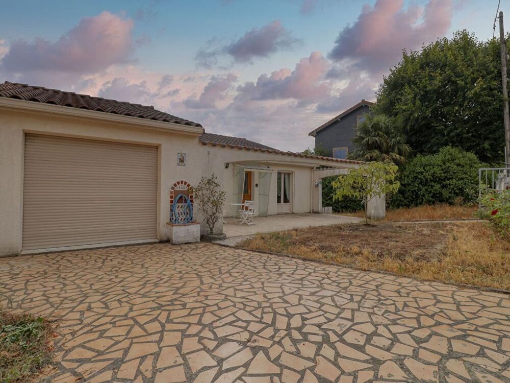 Maison de plain-pied de 110 m² - 3 chambres - Garage - Véranda -Terrain de 682 m²