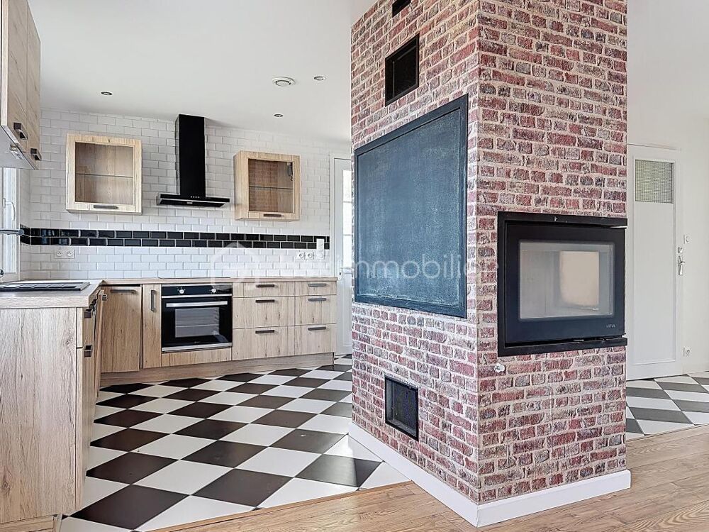 Maison sur sous sol aménagé bénéficiant d'un grand garage attenant