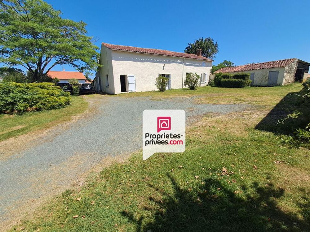 Ensemble immobilier maison d habitation et grange de caractère sur terrain constructible de 2 800 m²